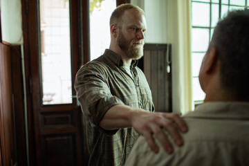 Intense conversation between two men