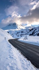 Winding mountain road in winter