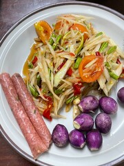 spicy papaya with black crab Thailand called farmer crab and fresh shrimp that is famous of Thailand Steer food. Select and soft focus.
