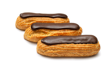 Fresh french eclairs on a white background