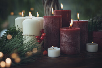 Ceremonial scene with burning candles and festive bokeh.Traditionally luminous symbol of holidays...