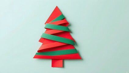 Colorful Paper Christmas Tree Craft on a Light Green Background