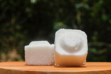 Close up of white salt in square shape. For graphic design, 3D rendering and banners