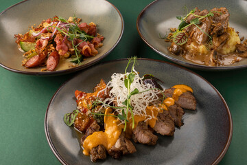 Three beautifully plated gourmet dishes featuring vibrant colors and textures, showcasing culinary artistry and creativity in modern cuisine with fresh ingredients and elegant presentation