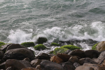 Beach and waves from top view. Turquoise water background from top view. Summer seascape