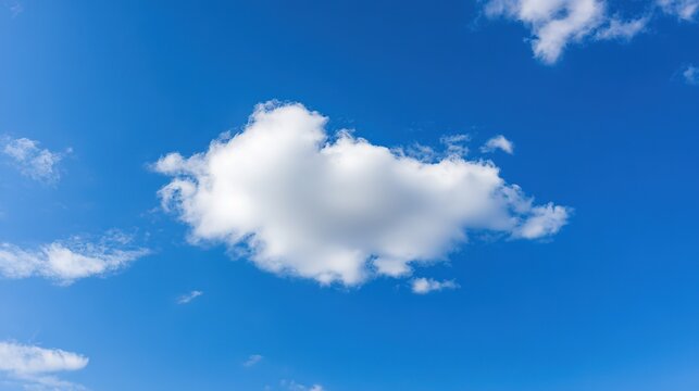 Soft White Cloud on Blue Canvas, Nature's Minimalist Touch with Delicate Daylight.