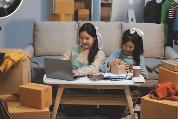 Young asian women happy after new order from customer. Surprise and shock face of asian woman success on making big sale of his online store. Online Selling. Online Shopping