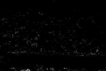 Black Grunge Crack Texture. High contrast black cracked grunge background texture.