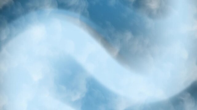 Light blue sky with hazy white clouds. Suitable for background images, nature themes, weather related content, and summer concepts. Bright and tranquil outdoor scenery.