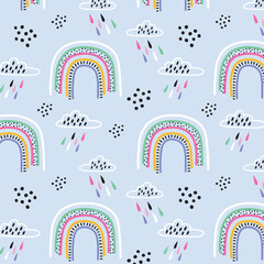 Cute scandinavian childish seamless pattern with trendy hand drawn rainbows in naive art style, can be used as kids texture for fabrics, textile, wallpaper, apparel etc, vector illustration
