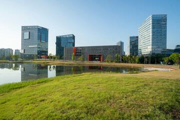 Fototapeta premium Park lawns and modern office buildings in technology parks