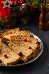 Delicious chicken and pork pate in Christmas decoration. Rustic style. Dark background, metal plates. Front view.