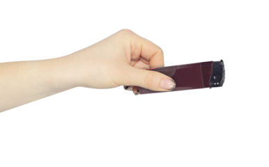 lighter in hand isolated from background, concept to pass or throw away