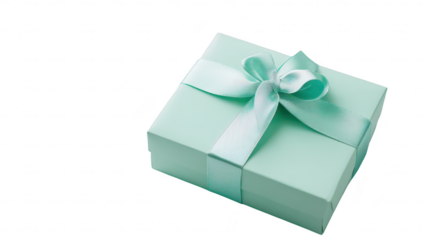 A beautifully wrapped mint green gift box adorned with a satin ribbon. placed on a clean white surface. suggesting a festive occasion or celebration in a serene setting