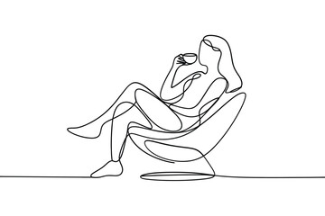 Woman enjoying a cup of coffee in a modern chair