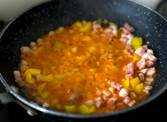 Pancetta Affumicata Italian Pork Belly with Yellow Bell Pepper and Onion Garlic Tomato Sauce in a Pan, Mediterranean Gourmet Cuisine