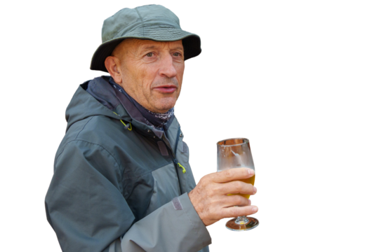Senior man relaxing outdoors drinking beer