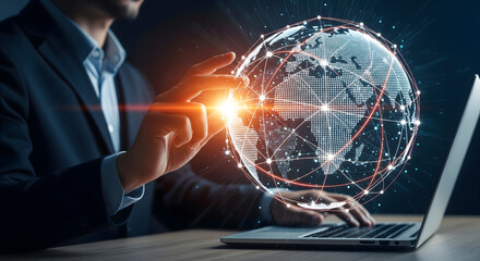 Global business network: Businessman using laptop with digital world map and connection lines.