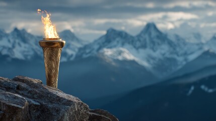 Lit Olympic torch with snowy mountains in the background, concept of the 2026 Italian Olympic Games