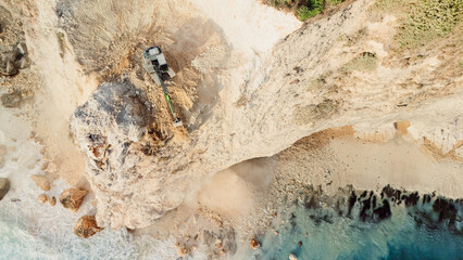 Escalators and the destroying of the cliff. Aerial view, top down