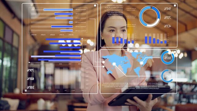 Confident businesswoman using digital data analytics interface with graphs and global map for strategy planning, management, and decision making in modern business environment.