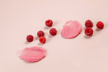scrub skincare and raspberry berries. cosmetic product smear swatch