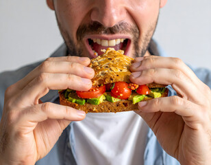 close-up of a person's mouth and hands eating a half-eaten veggie sandwich, generative ai