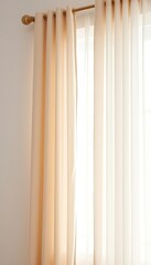 Elegant window treatment with light colored opaque draperies and sheer curtains hung from a metallic rod in a staged setting