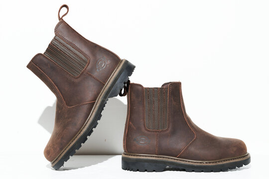 Kent, uk 01.01.2025 Dickies Rawhide Dealer Chelsea Boots Brown Leather SBP HRO SRA Work Safety boots. Construction and labour shoes and footwear.