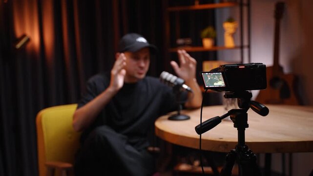 Influencer preparing his home studio for a podcast