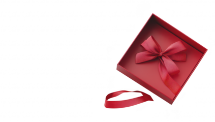 A beautifully wrapped red gift box with a large ribbon. placed on a clean white surface. symbolizing celebration and joy. ideal for holidays or special occasions