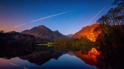 meteor. Vibrant meteor trails painting the night sky, mirrored perfectly in a tranquil alpine lake. travel magazines, destination branding, designed for outdoor magazines and nature guides.
