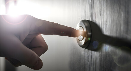 Hand pressing a button door entrance access control security system technology innovation future digital