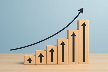 Growth Concept with Wooden Blocks Showing Increasing Arrows on Blue Background