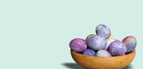 Futuristic Easter eggs in a wooden container. Cosmic theme. Pastel colors, blue dominance, minimalist egg decoration. Modern, futuristic, sustainable Easter