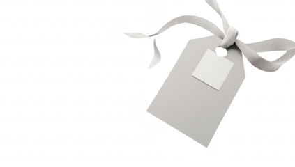 A minimalist gray tag with a blank label and ribbon on a soft white background. ideal for product labeling or gift tagging in a clean and modern design