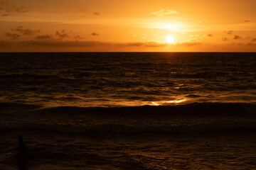 A beautiful amazing sunset over the Loccadive Sea as seen from Negombo Beach, Sri Lanka.
