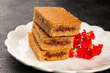 Biscuit cake portion filling jam sweet dessert cake natural product tasty snack fresh delicious gourmet food background on the table rustic top view copy space