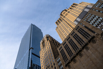 Low angle view of skyscrapers and architecture in Chicago, offering a vibrant cityscape scene.
