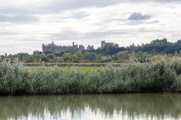 Fototapeta premium view of Arundel Castle from The River Arun West Sussex England