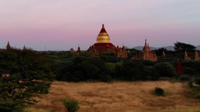 Golden light bathes the ancient temples of bagan at dusk, myanmar