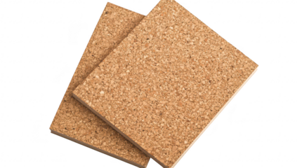 Two stacked cork boards placed on a clean surface. their textured surfaces. ideal for crafting. home organization. or office use. with a minimalistic background enhancing their natural look