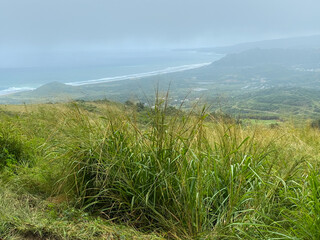 Cherry Tree Hill in Barbados on a rainy, foggy day. Fitting for Scotland district. View of Walkers Beach, Chalky Mount, Savannah, Walker's, Corbins Village, Windy Hill, Saint Andrew. Selective focus.