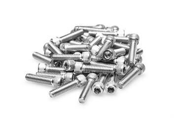 Pile of chrome bolts isolated on white background