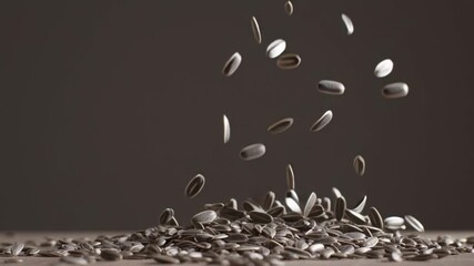 Slow motion macro footage of sunflower seeds falling in air and piling on wooden surface, perfect for food industry, agriculture, nutrition, and healthy organic snack concept visuals. - Powered by Adobe