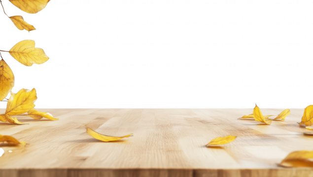 A serene wooden table adorned with scattered yellow autumn leaves. set against a clean white background. creating a cozy atmosphere ideal for seasonal decor or culinary presentations
