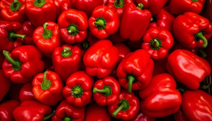 Close-up of a large pile of red bell peppers