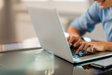 Woman working on laptop