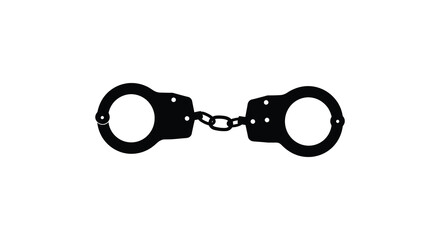 Black metal handcuffs displayed on a white background a stark silhouette
