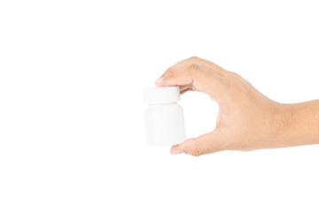Hand holding a blank white plastic pill bottle for medicine or supplements, isolated on white background with clipping path.